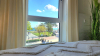 Schlafzimmer 1 mit Blick zur Ostsee und Seebrücke